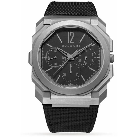 Bvlgari chronograph watch with a silver-tone case, dark grey dial with three subdials, and a black fabric strap.