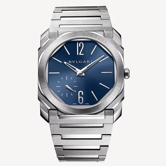 Bvlgari watch with a silver-tone case and bracelet, blue dial, and small seconds subdial.