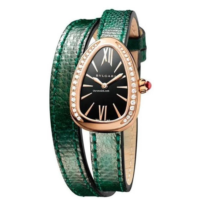 Bvlgari watch with a black dial, rose gold-tone teardrop-shaped stone-set bezel, and a green double-wrap leather strap.