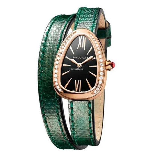 Bvlgari watch with a black dial, rose gold-tone teardrop-shaped stone-set bezel, and a green double-wrap leather strap.