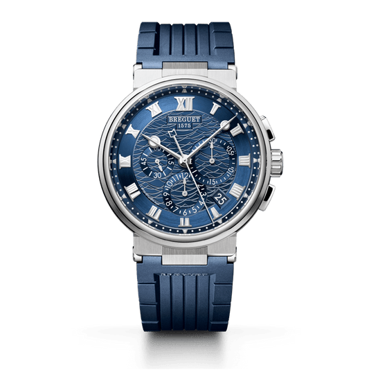 Breguet Marine chronograph watch with a patterned blue dial, Roman numerals, silver-tone case, and blue rubber strap.