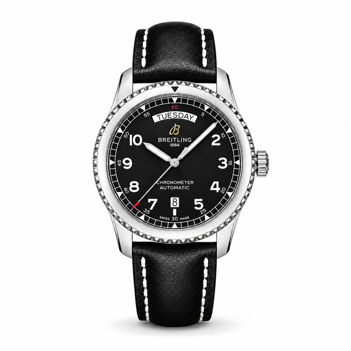 A Breitling Aviator 8 Automatic with a stainless steel case, black dial featuring white Arabic numerals, day and date window, and a black leather strap with white stitching.