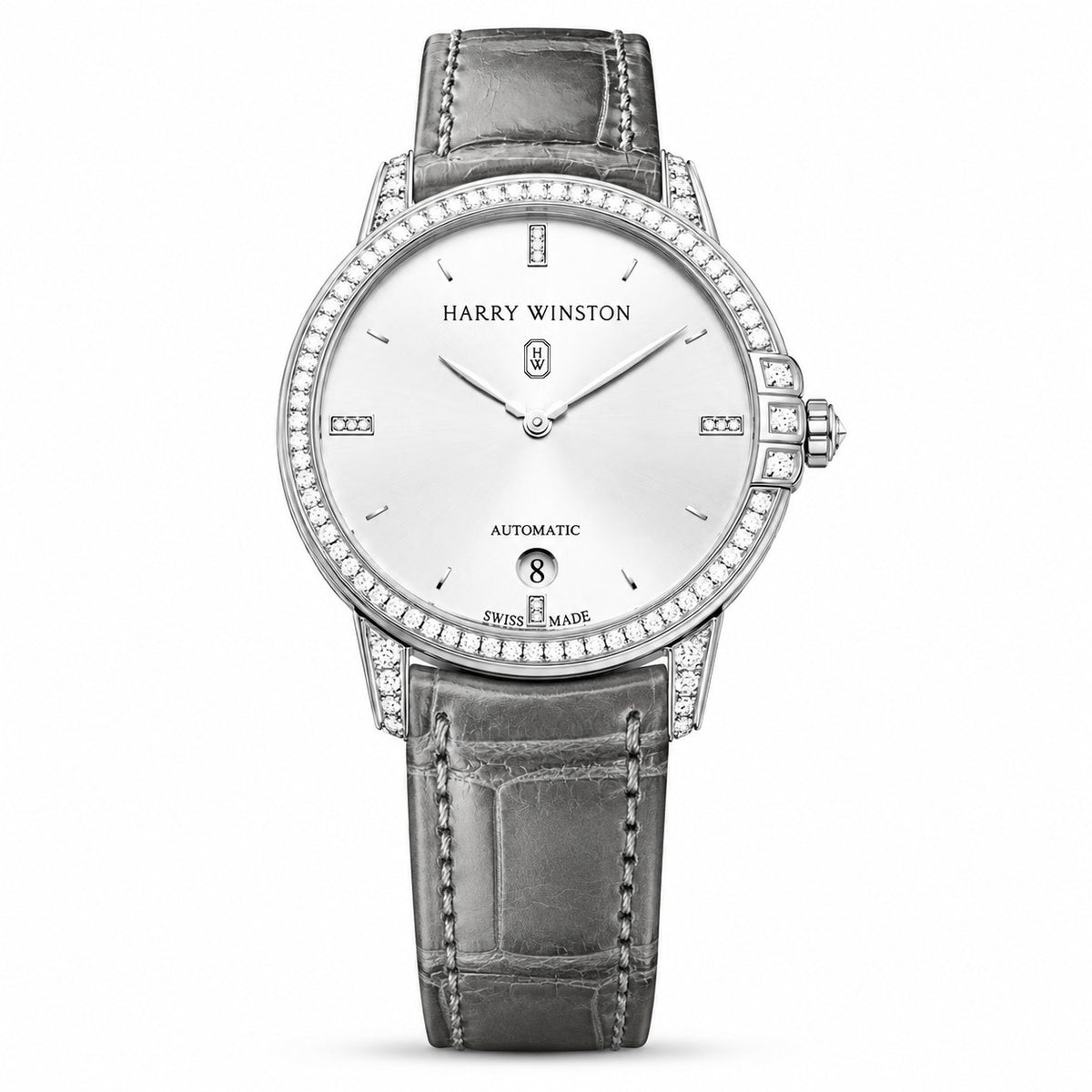 Harry Winston watch with a silver dial, diamond hour markers, date window, diamond-set silver tone bezel and lugs, and grey leather strap.