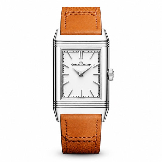 Jaeger-LeCoultre Reverso watch with a rectangular silver-tone case, white dial with slim hour markers, and tan leather strap.