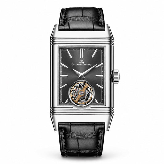 Jaeger-LeCoultre rectangular watch with a dark dial, exposed mechanism at 6 o’clock, silver-tone case, and black leather strap.