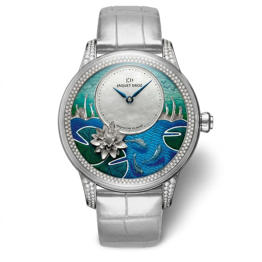 Jaquet Droz watch with a silver-tone case, stone-set bezel, blue and green illustrated dial with a raised silver flower, and a silver-grey leather strap.