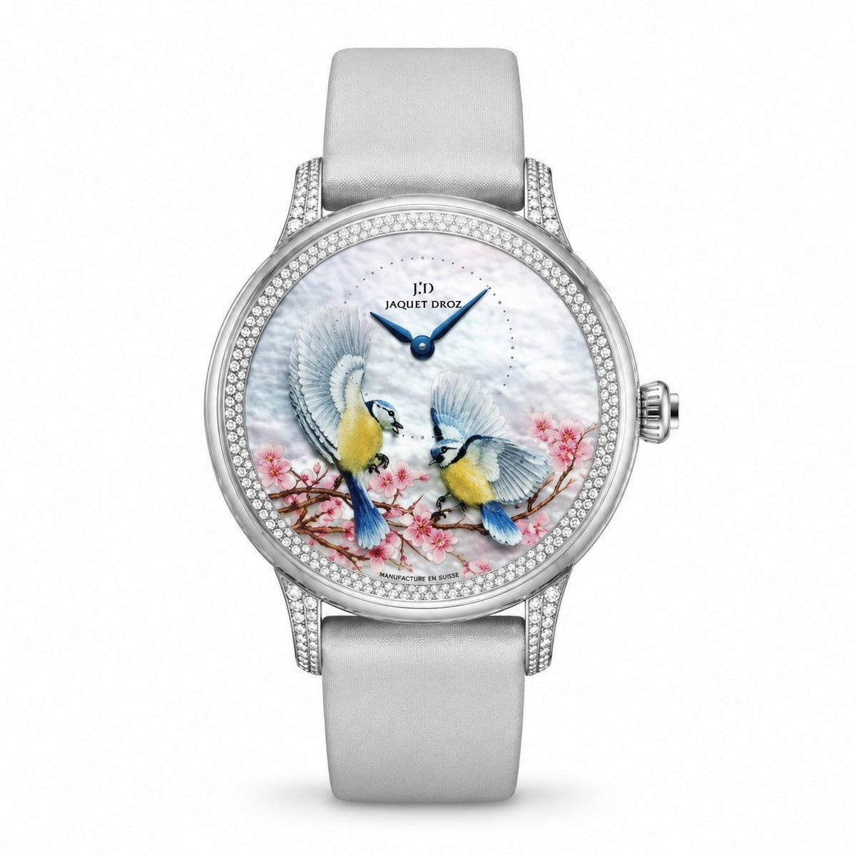 Jaquet Droz watch with a silver-tone case, stone-set bezel, dial depicting two birds among pink blossoms, blue hands, and a light grey strap.