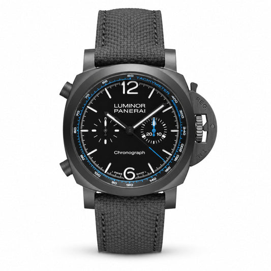 Panerai Luminor chronograph with a black dial, two subdials, blue accents, black case, and dark grey fabric strap.