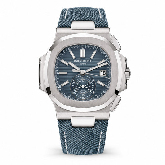 Patek Philippe Nautilus chronograph with a blue dial, date display, silver-tone case, and blue fabric strap with white stitching.