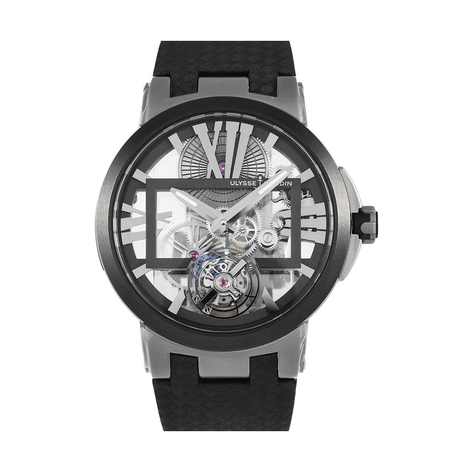 Ulysse Nardin skeleton watch with exposed gears, a tourbillon at 6 o’clock, silver tone hands and hour markers, black bezel and black textured strap.