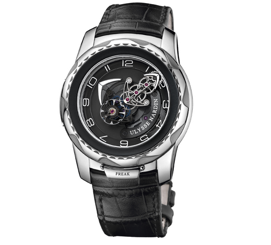 Ulysse Nardin Freak watch with a black dial, exposed central mechanism, silver tone Arabic numerals, polished silver tone case and black leather strap.