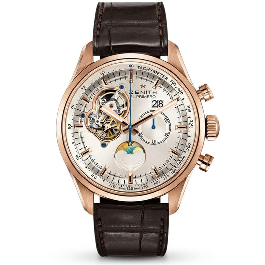 Zenith El Primero Tourbillon watch in rose gold with a silver dial, open tourbillon aperture at 11 o'clock, chronograph subdials, date window, moon phase display, and dark brown alligator leather strap.
