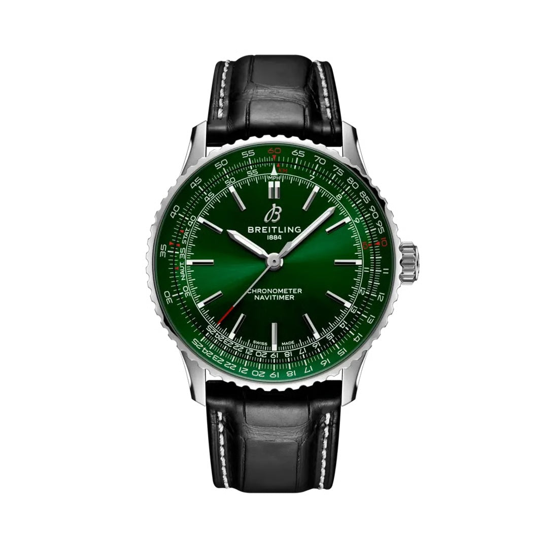  Breitling Navitimer luxury watch featuring a rich green dial with silver-tone hands and hour markers, stainless steel case, signature slide rule bezel, and black leather strap with contrast white stitching.